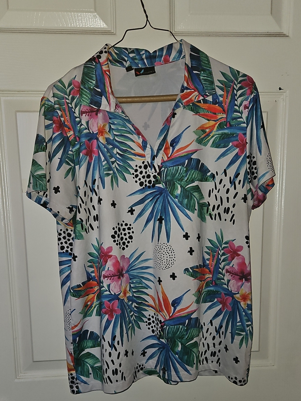 Yatta Golf "Birdies of Paradise" women's performance golf polo